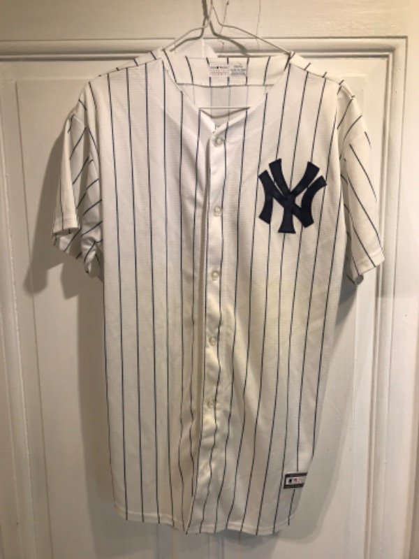 Producto - Remera/Camisa GENUINE MERCHANDISE azul y blanca Talle 16/18 años- PRECIO: 65x