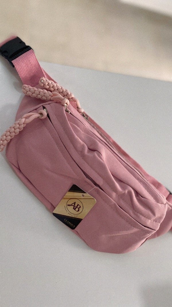 Producto - Riñonera Trenza. Tela impermeable. Rosa