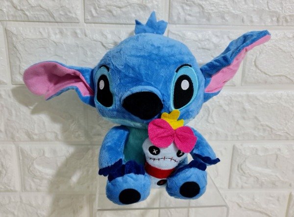 Producto - Peluche Stitch con juguete 22 cm