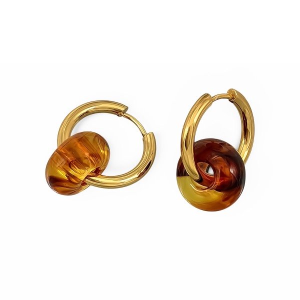 Producto - Argollas de acero dorado con Dona Carey