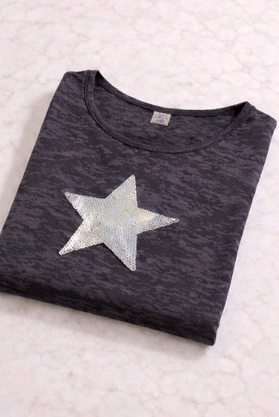 Producto - Remera  STAR GLOW gris ..Calce suelto