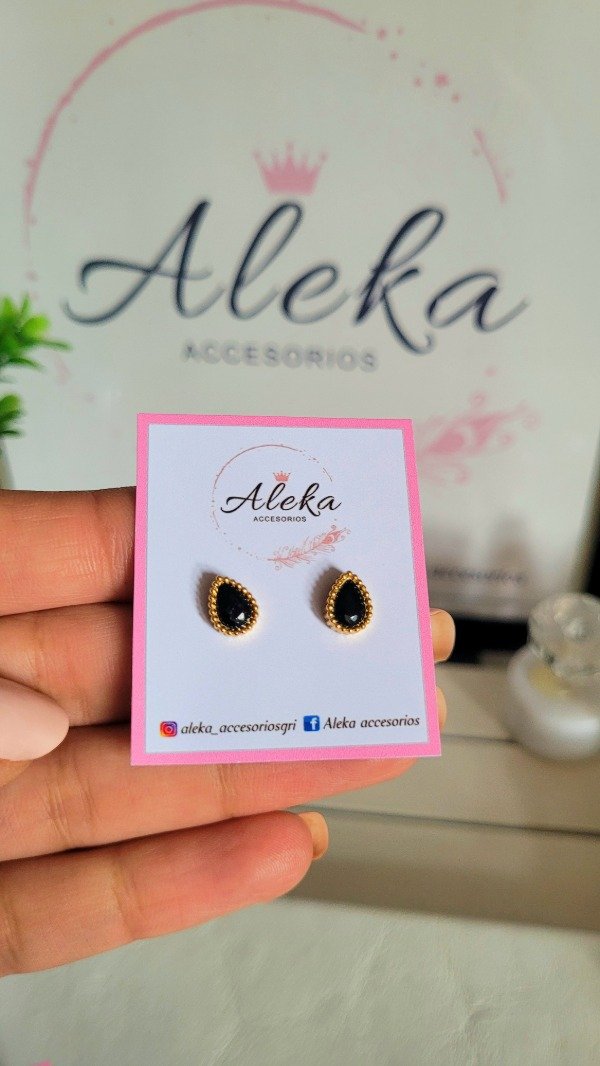 Producto - Aros gotas cubic negro de acero dorado - 0