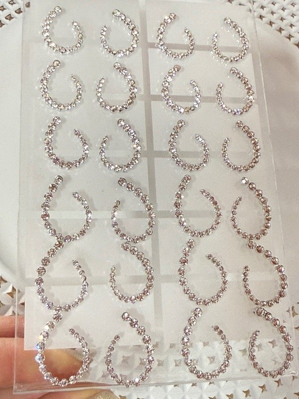 Producto - A1229 Blíster x 12 aros fiesta con strass acero quirúrgico