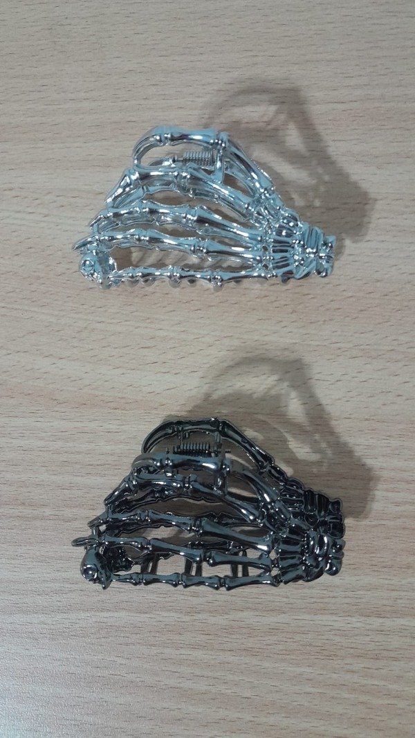 Producto - broche para pelo mano esqueleto