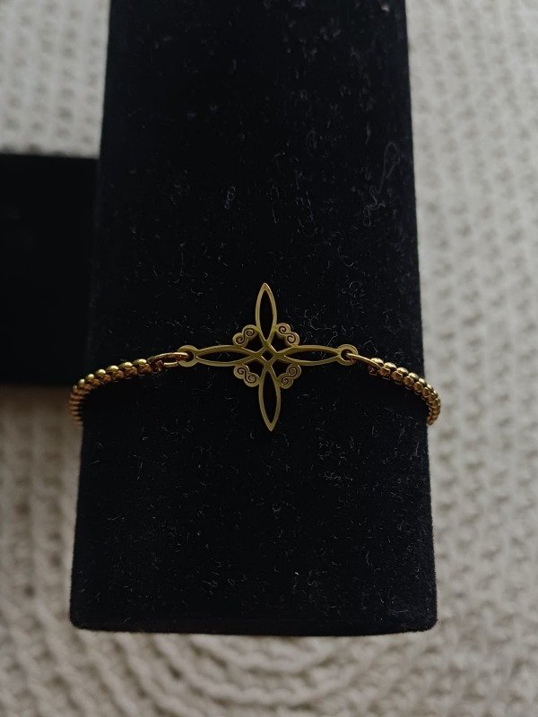 Producto - Pulsera nudo de bruja dorado