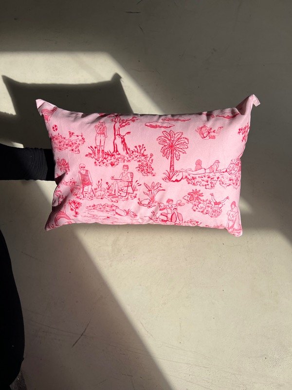 Producto - Almohadón Historias Mínimas Rosa