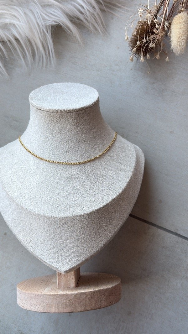 Producto - Collar de acero dorado