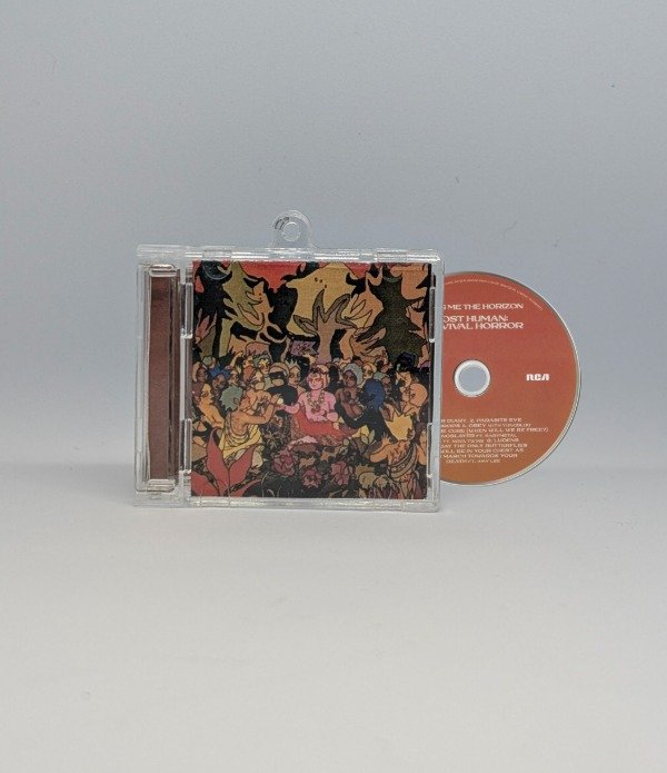 Producto - Post Human: Survival Horror - Llavero CD