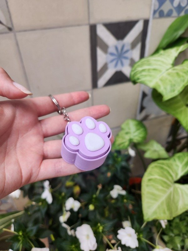 Producto - Llavero Clicker Patita Anti Estrés