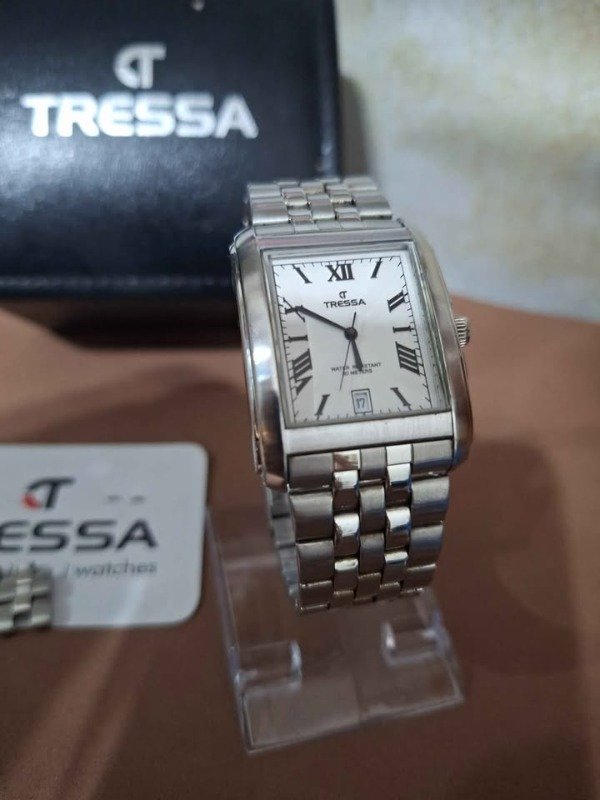 Producto - Tressa con caja y papeles.