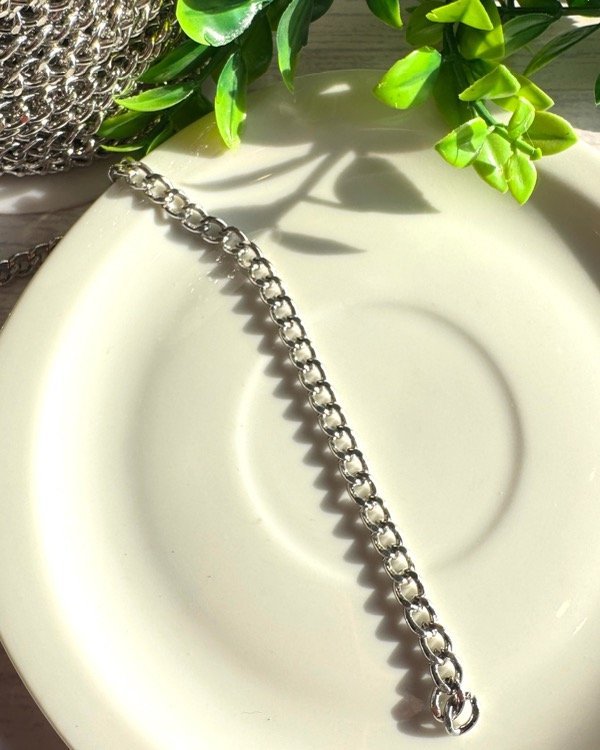 Producto - CADENA TORZADA PLANA REFORZADA NIQUEL