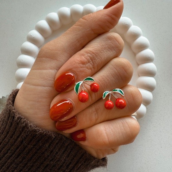 Producto - Aro pasante de cereza verde con rojo- acero blanco