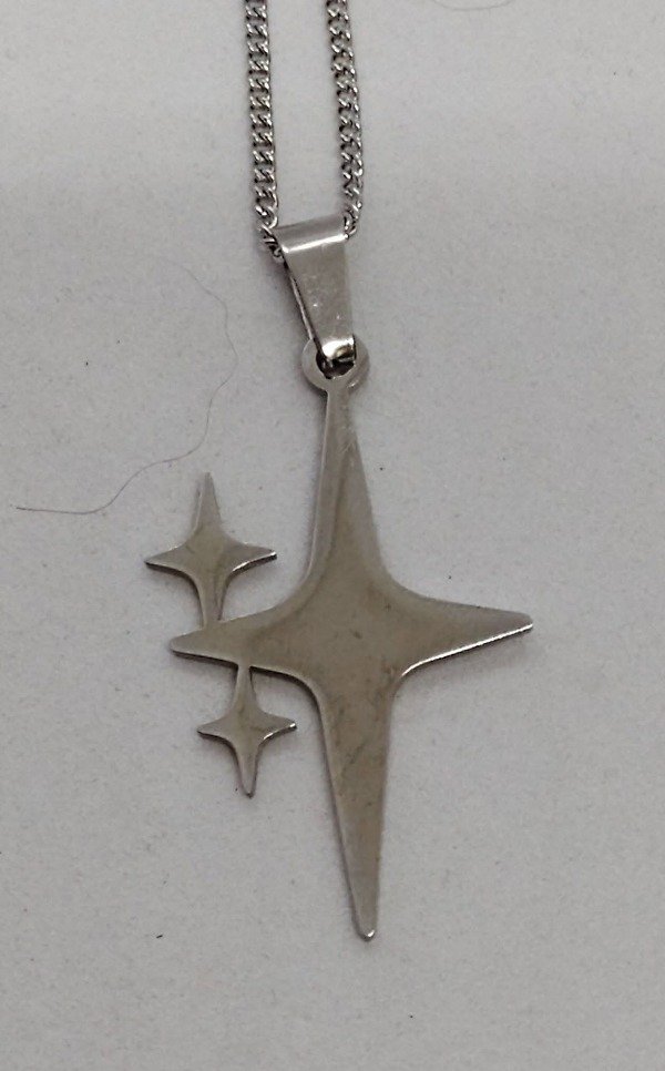 Producto - Dije de estrella con destellos