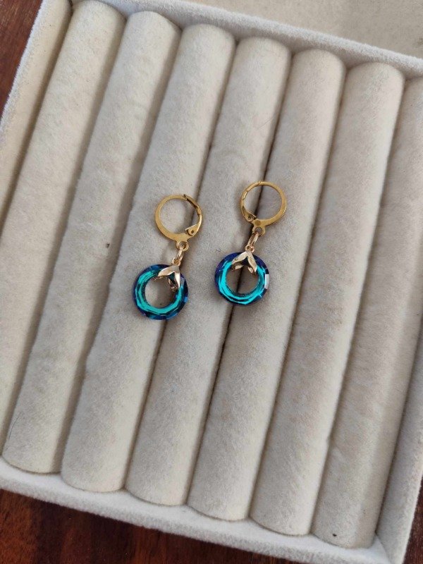 Producto - Aros argolla zona celeste. Acero dorado.