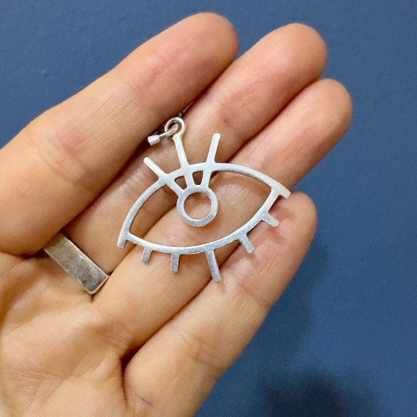 Producto - Dije Ojo chico