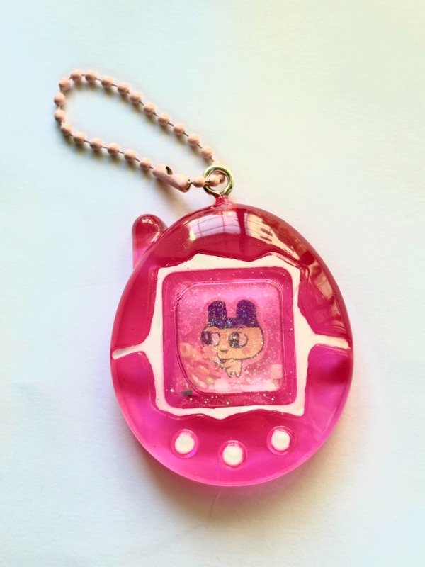 Producto - Tamagotchi shaker rosa ver. 1