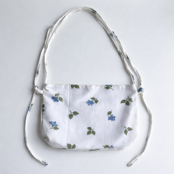 Producto - Cartera floreada regulable