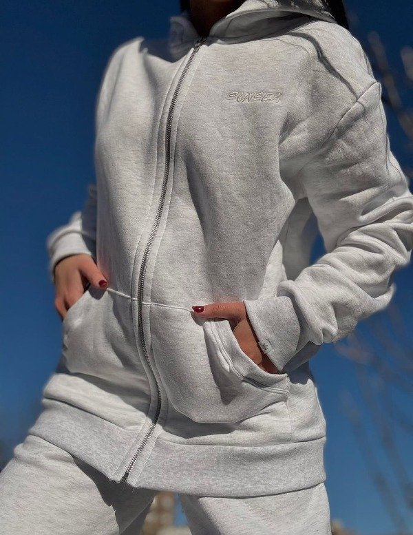 Producto - Campera clásica unisex con capucha y bolsillos, frisa WHITE MELANGE