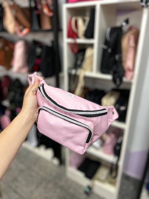 Producto - Riñonera tipo impermeable rosa