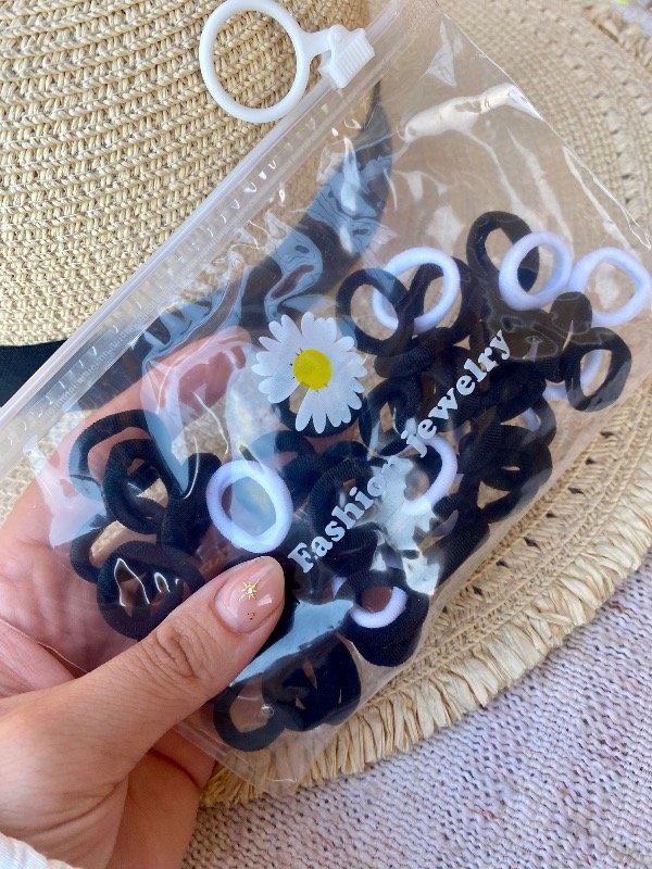 Producto - Pack colitas blanco y negro