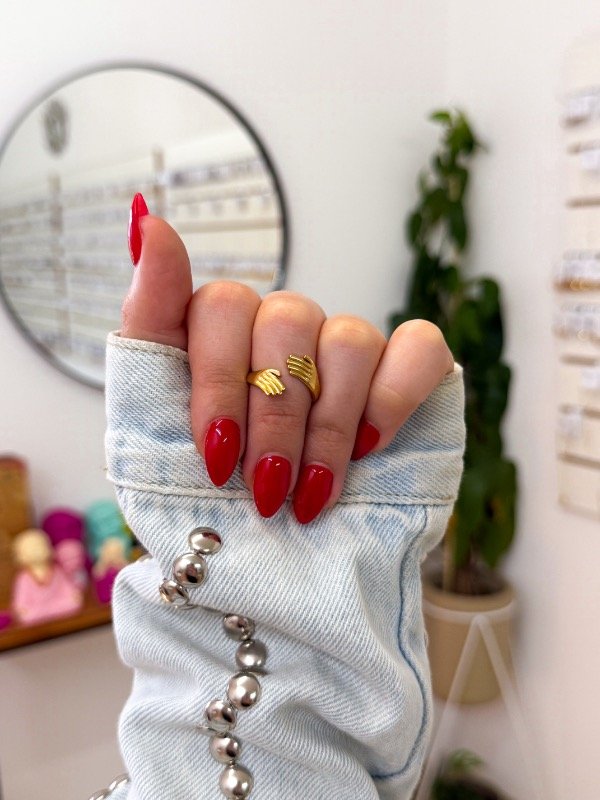 Producto - Anillo acero dorado abrazo talle 8
