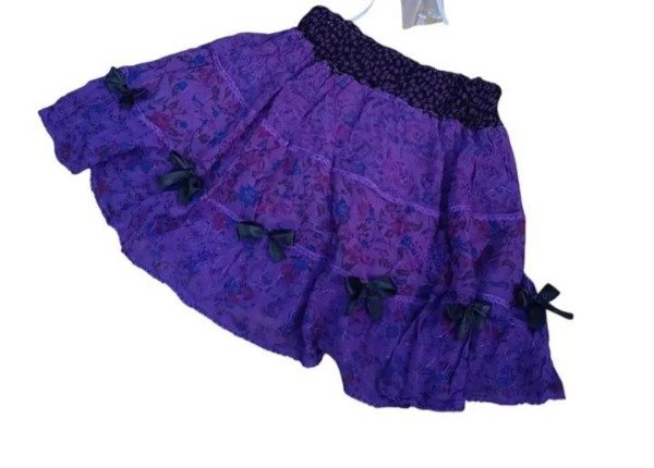 Producto - Pollera moños