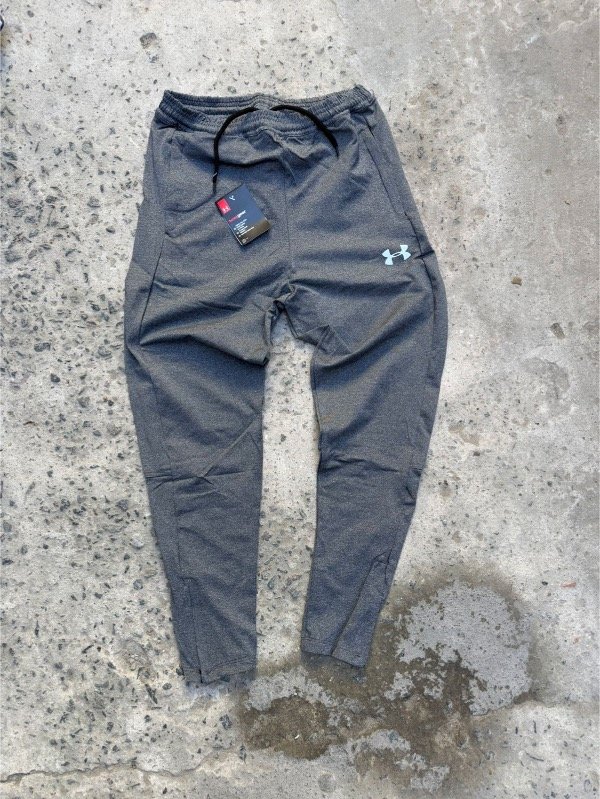 Producto - Pantalón deportivo Nike y UA - 0