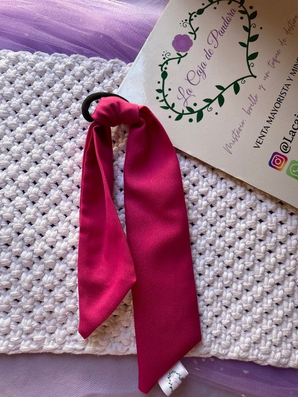 Producto - Coletero lazo fucsia