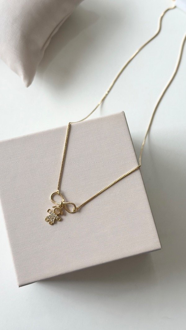Producto - Conjunto infinito con hija laminado en oro 18k