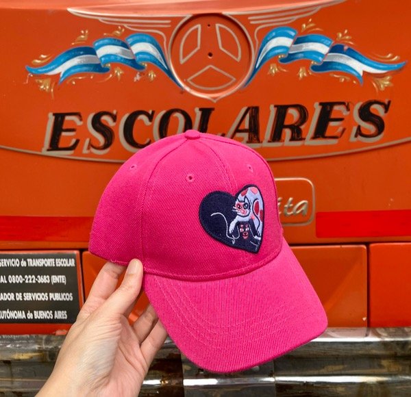 Producto - Gorra fucsia para niñx
