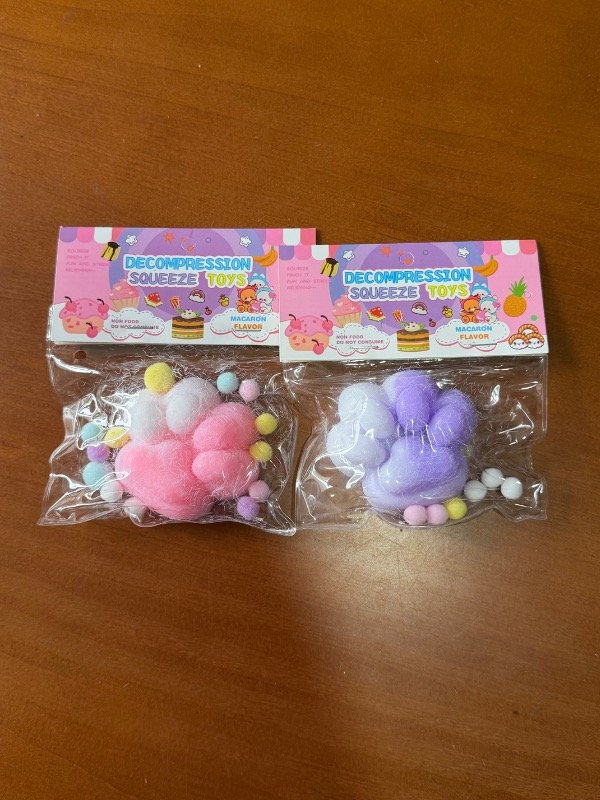 Producto - Taba squishy huella pelitos