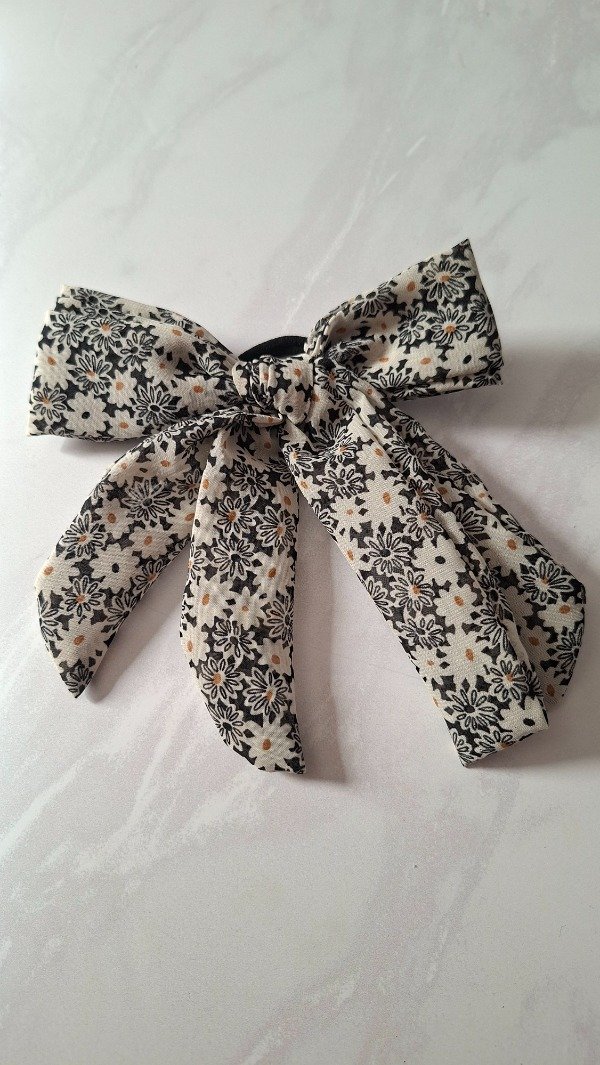 Producto - Moño margaritas