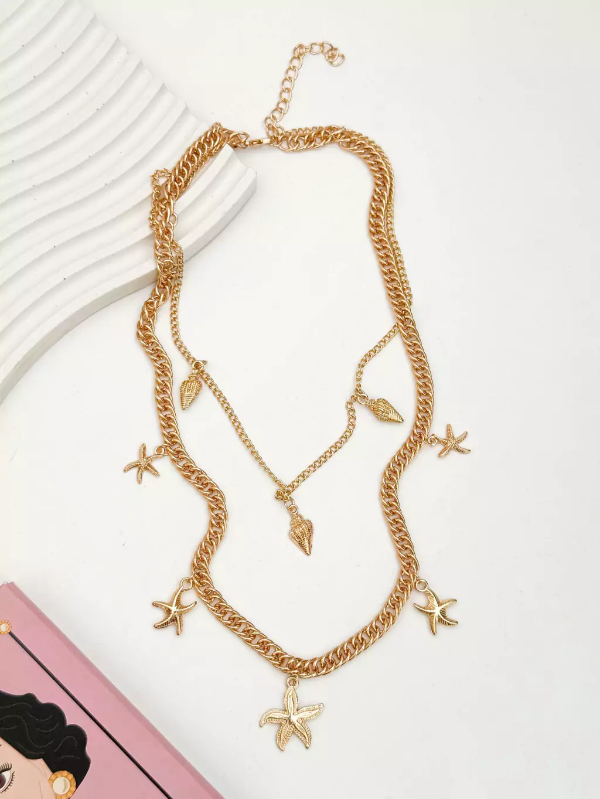 Producto - Collar acero dorado doble estrellas de mar