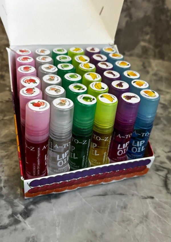 Producto - Lip Gloss Frutal, con aplicador bolilla