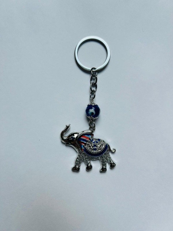 Producto - Llavero metálico elefante esmaltado y manto con strass