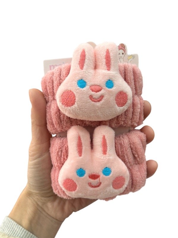 Producto - Muñequera conejo rosa