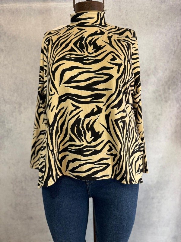 Producto - POLERA ZEBRA ALGODON GAMUZADO OVERSIZE