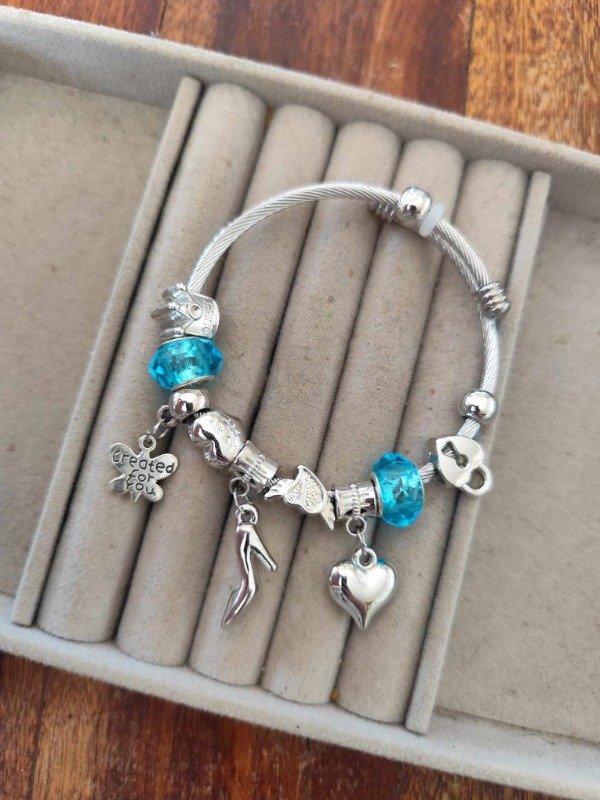 Producto - Pulsera pandora zapatito cesleste.