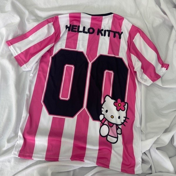 Producto - Chomba kitty fucsia