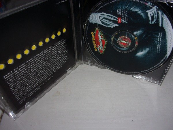 Producto - CD ENRIQUE BUNBURY FLAMINGOS ARG HEROS DEL SILENCIO 44A - 2
