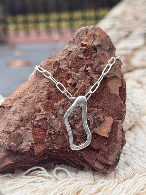 Producto - Conjunto arena (cadena + dije)