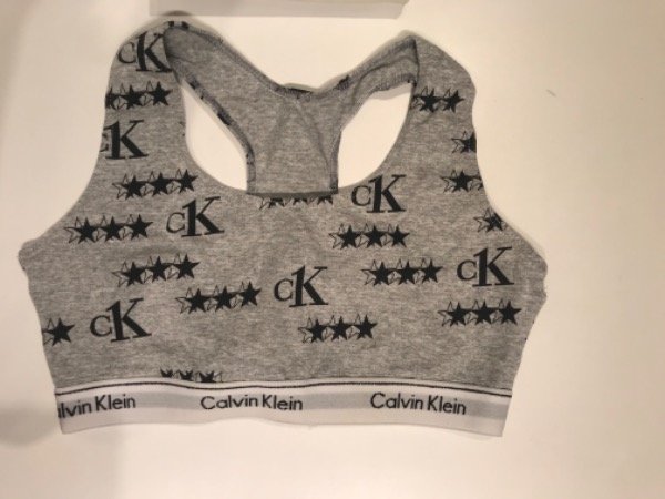 Producto - Corpiño CALVIN KLEIN en caja gris logos y estrellas- Talle M/90- PRECIO: 48x - 1