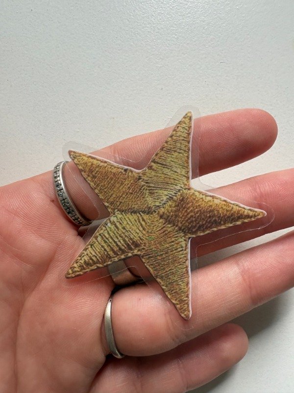 Producto - sticker estrella dorada