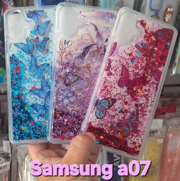 Producto - Fundas mariposas brillo con agua. Samsung a07