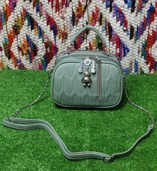 Producto - LINEA VLADY MORRAL DE CUERO PU