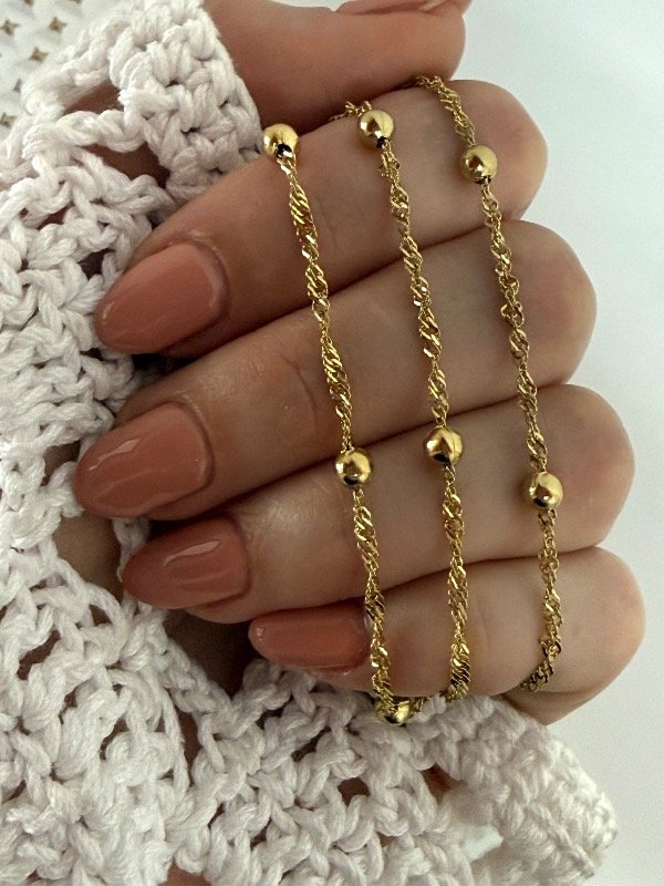 Producto - CD180 Cadena torzada con bolitas acero dorado