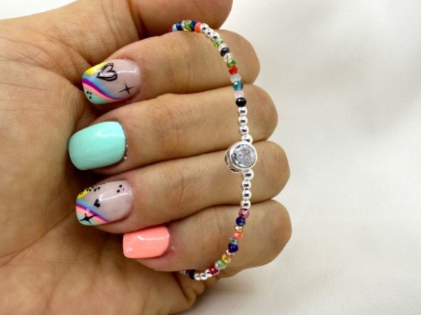 Producto - Pulsera con bolitas de plata, piedras de colores y dije susano