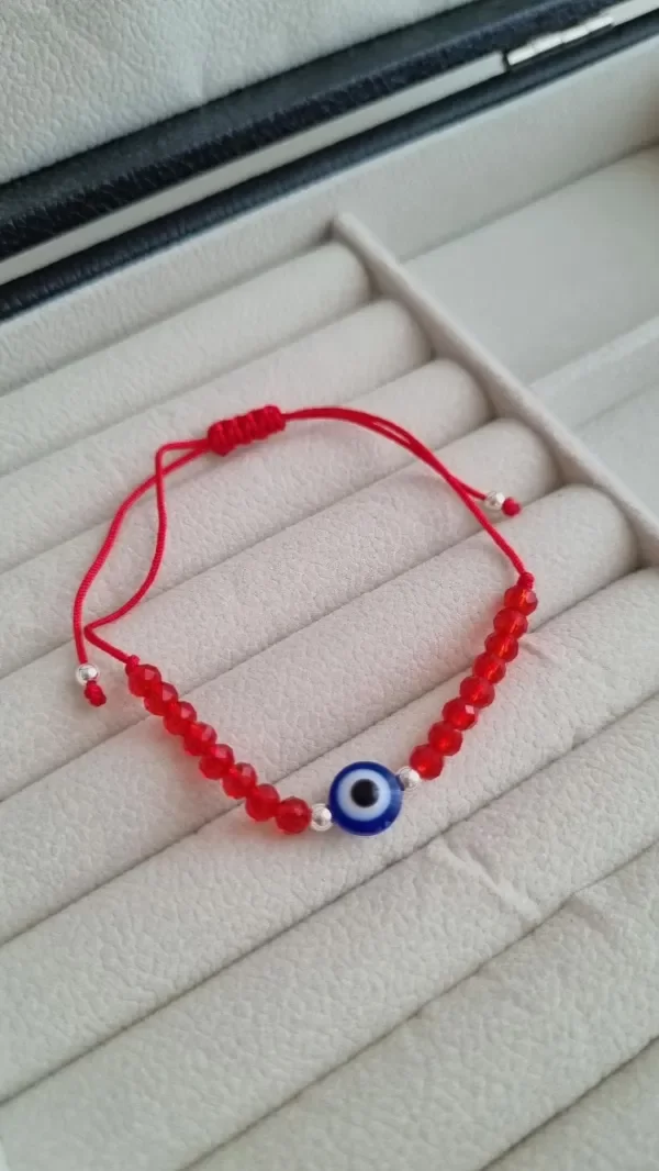 Producto - Pulsera regilable roja con ojos y bolitas plata925