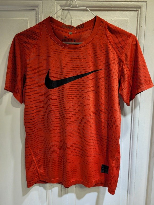 Producto - Remera NIKE dri fit colorada Talle 12/14 años - PRECIO: 14X