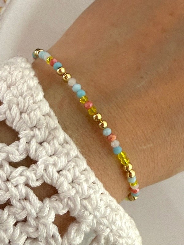 Producto - PD115 Pulsera piedritas y bolitas acero dorado
